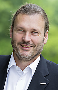 Porträtfoto von Dr. Peter Löwe
